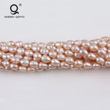 10-11mm Natural Pink Rice Shape Freshwater Pearl Beads String