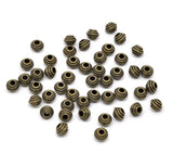 100 Bronze Spacer Beads 6x5mm