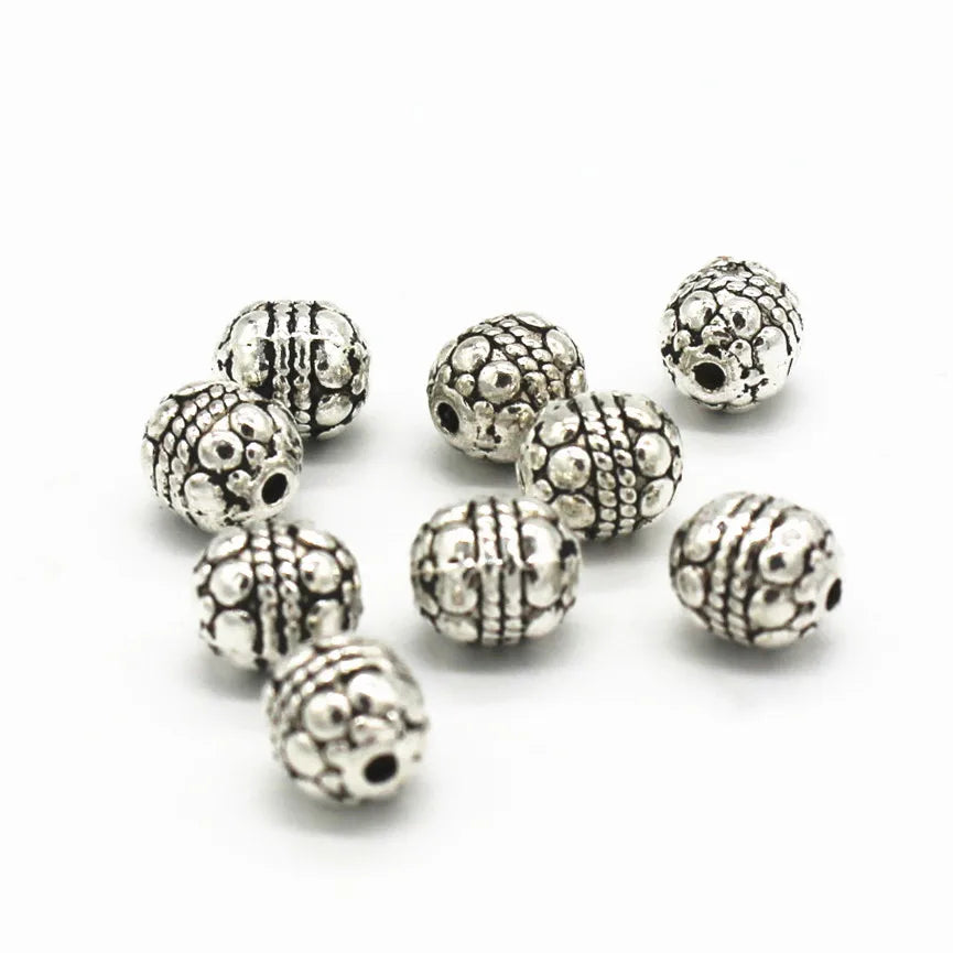 100 PCS Vintage Metal Alloy Spacer Beads Nepal Carved Hole Beads
