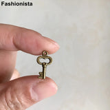 100pcs Tiny Key Charms Antique Bronze 8x15mm for Pendants Earrings Zipper Pulls