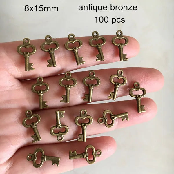 100pcs Tiny Key Charms Antique Bronze 8x15mm for Pendants Earrings Zipper Pulls