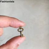 100pcs Tiny Key Charms Antique Bronze 8x15mm for Pendants Earrings Zipper Pulls