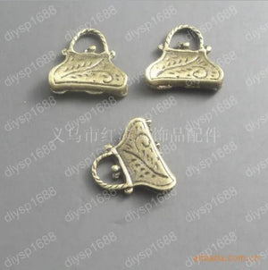 100 pcs Antique Bronze Charms Pendants for Jewelry Handbag Shape
