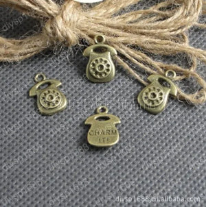 100 pcs/lot Antique Bronze Plated Telephone Shape Charms Pendants