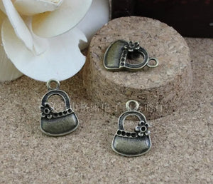 100 pcs Antique Bronze Handbag Shape Charms Pendants for Jewelry Making