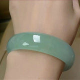 Green Jade Bangle Bracelet with Floating Flower Design