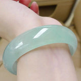 Green Jade Bangle Bracelet with Floating Flower Design