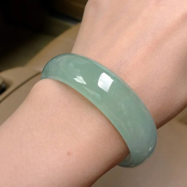 Green Jade Bangle Bracelet with Floating Flower Design