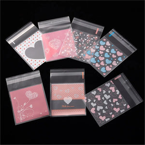 100Pcs 7x7/10x10cm Heart Clear Candy Bag Self Adhesive Plastic Gift Pouch