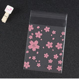 100Pcs Snowflake Christmas Plastic Candy Cookie Gift Bags