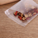 100Pcs Snowflake Christmas Plastic Candy Cookie Gift Bags