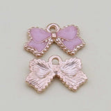 100pcs Pink Bow-knot Pendant DIY Alloy Accessories