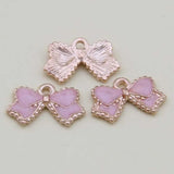 100pcs Pink Bow-knot Pendant DIY Alloy Accessories