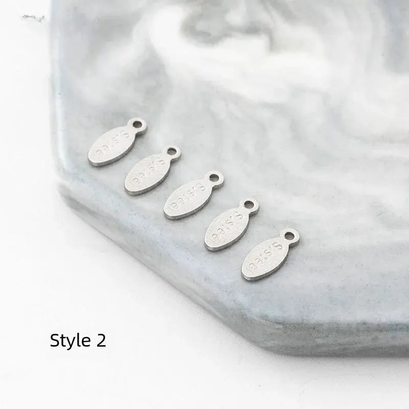 100pcs Stainless Steel Engraved Tail Chain Hook Spring Season Pendant
