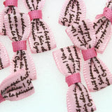 100pcs Pink Letter Printed Bowknot Mini Ribbon Bow 32x10mm
