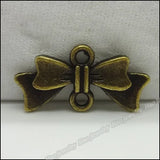 100pcs Vintage Charms Bow Pendant Bronze DIY Jewelry Making