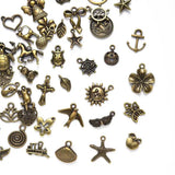 100pcs Bronze Vintage Metal Charms Jewelry Making Set DIY 9-26MM