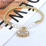 Zirconia Paved Shell Pearl Eyes Bracelets for Women