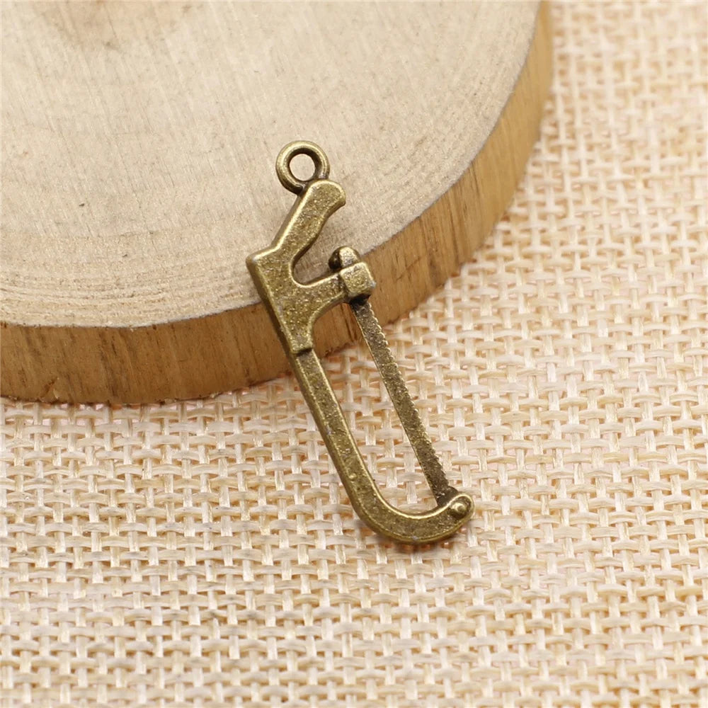 120pcs 30x9mm Saw Charm Antique Bronze Pendant Jewelry Accessories