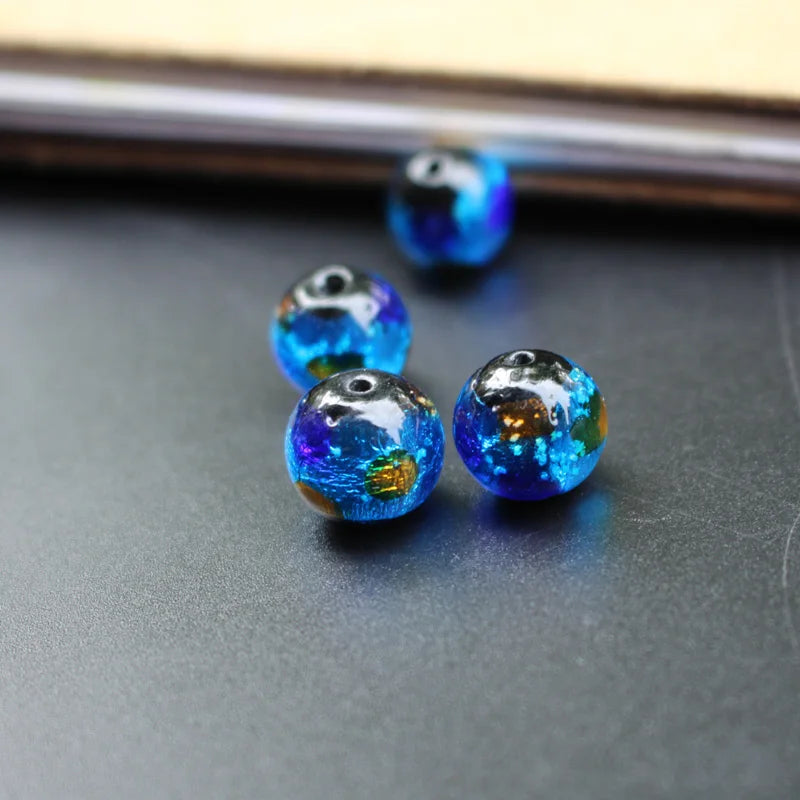 12mm Lampwork Glass Beads Foiled Ocean with orange dots Round