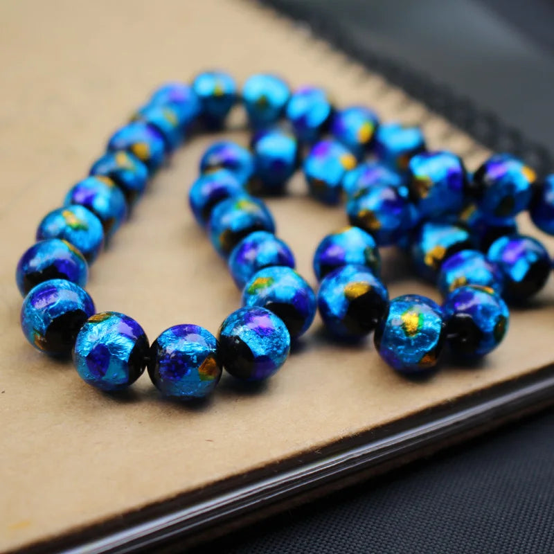 12mm Lampwork Glass Beads Foiled Ocean with orange dots Round
