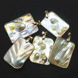 Golden Mother of Pearl Pendant from Deep Water