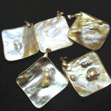 Golden Mother of Pearl Pendant from Deep Water