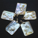 Golden Mother of Pearl Pendant from Deep Water