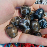 Weathered old agate double tiger tooth dalo dzi beads