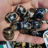 Weathered old agate double tiger tooth dalo dzi beads