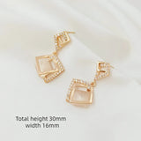 New 14K Copper Clad Zircon Cat Eyes Earrings