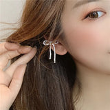 Women's Cubic Zircon Clip Earrings with Pearl Knot Design