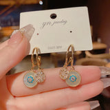 Zircon Star Shell Silver Needle Earrings