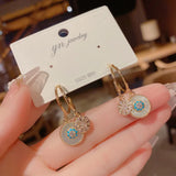Zircon Star Shell Silver Needle Earrings