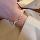 Gold Plated Baroque Pearl Bow Bracelet with Zircon Inlay
