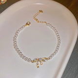 Gold Plated Baroque Pearl Bow Bracelet with Zircon Inlay