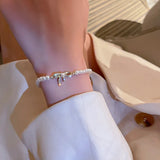 Gold Plated Baroque Pearl Bow Bracelet with Zircon Inlay
