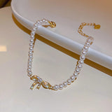 Gold Plated Baroque Pearl Bow Bracelet with Zircon Inlay