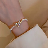 Gold Plated Baroque Pearl Bow Bracelet with Zircon Inlay