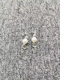 UNOde50 Electroplated 925 Silver Pearl Key Earrings