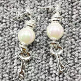 UNOde50 Electroplated 925 Silver Pearl Key Earrings
