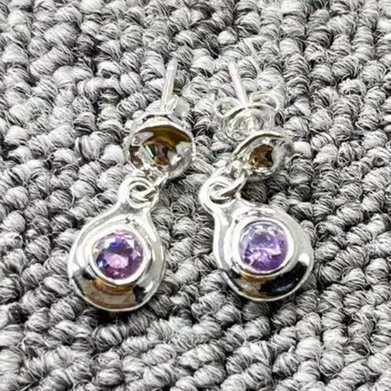 UNOde50 925 Silver Purple Round Earrings