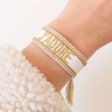 Adjustable Rope Woven Bracelet with Tassel Embroidery