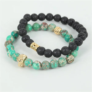 Natural lava/green regalite stone bead skull bracelet