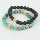 Natural lava/green regalite stone bead skull bracelet