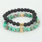 Natural lava/green regalite stone bead skull bracelet