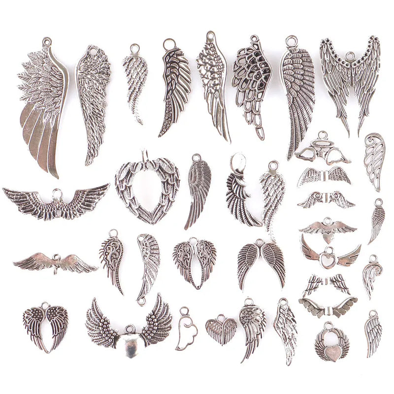 35Pcs Mix Silver Angel Bird Feather Elf Hollow Wings Charms Pendant DIY