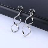 Irregular Metal Wave Pattern Glitter Clip on Earrings for Women