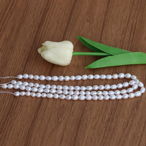 (5 Strands/lot)7-8mm Natural Freshwater Pearl Oval Rice Shape