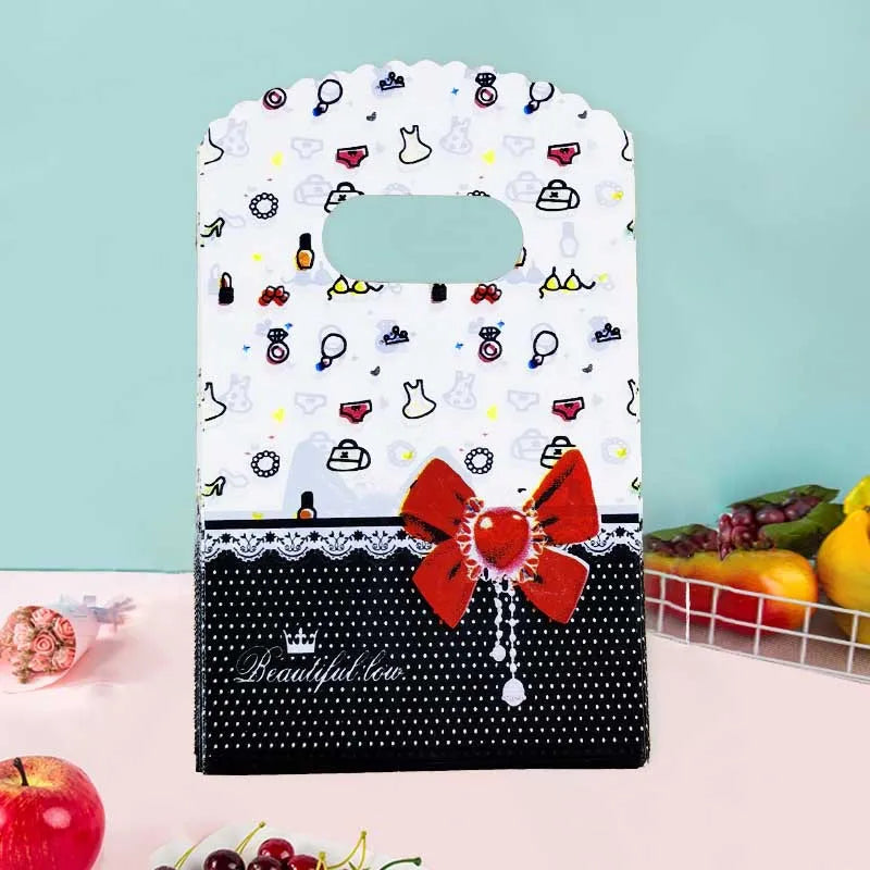 50Pcs/Lot 9*15cm Jewelry Bow Gift Plastic Bags Boutique Shopping Packaging Bag